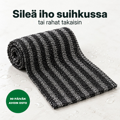 Soldahl Slätro kuoriva suihkupyyhe mustana, rullalla ja vesipisaroiden peittämänä