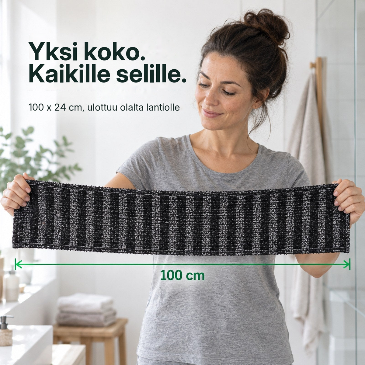 Nainen pitelee kuorintapyyhettä ylhäällä, 100 x 24 cm