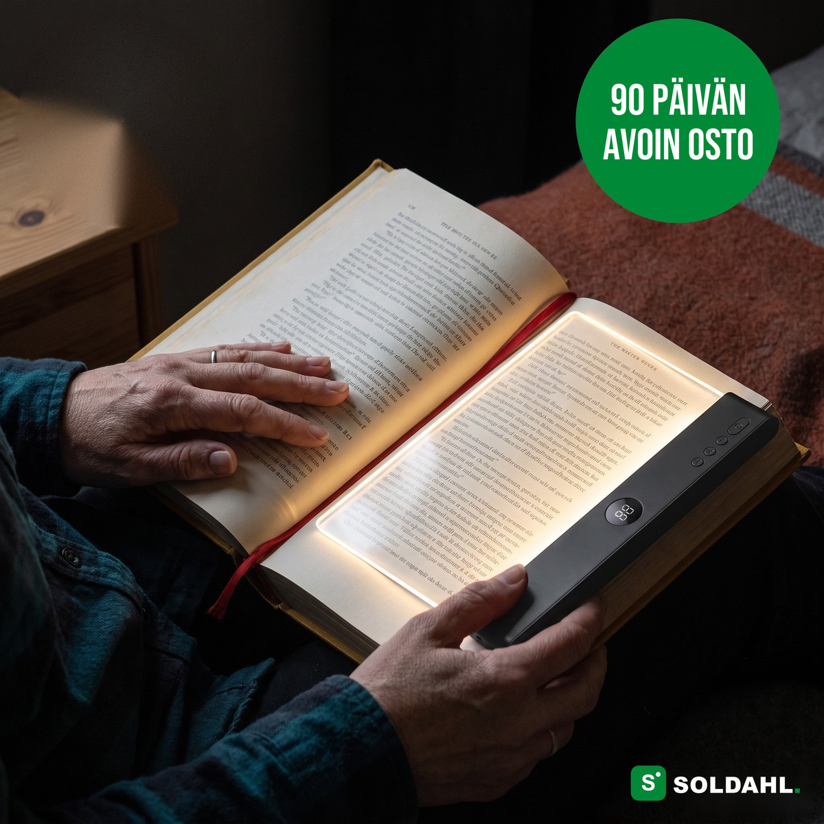 Soldahl Läsro, läpinäkyvä kirjavalo, joka valaisee kirjan sivun sängyssä yöllä
