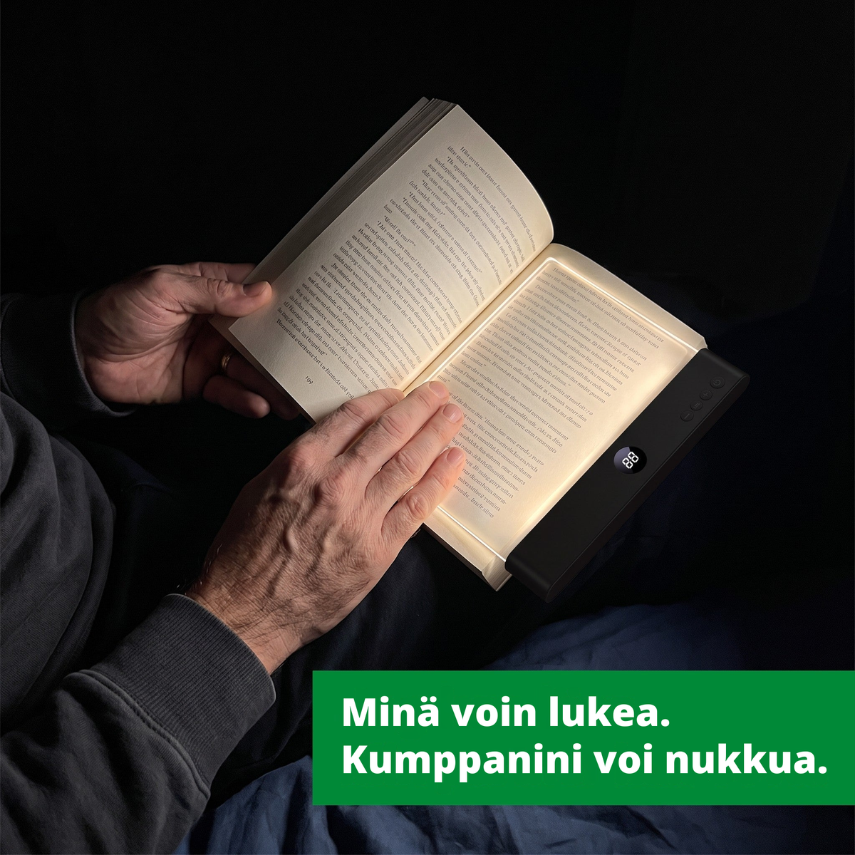 Minä voin lukea. Kumppanini voi nukkua. Läsro on kirjan sivun päällä pimeässä