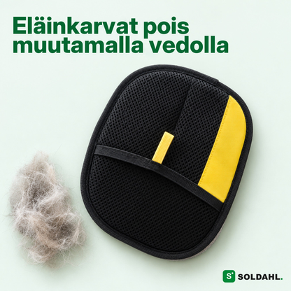 Soldahl-lemmikkikarvahanska mustalla verkkotaskulla ja keltaisella vetolenkillä kissankarvatupon vieressä